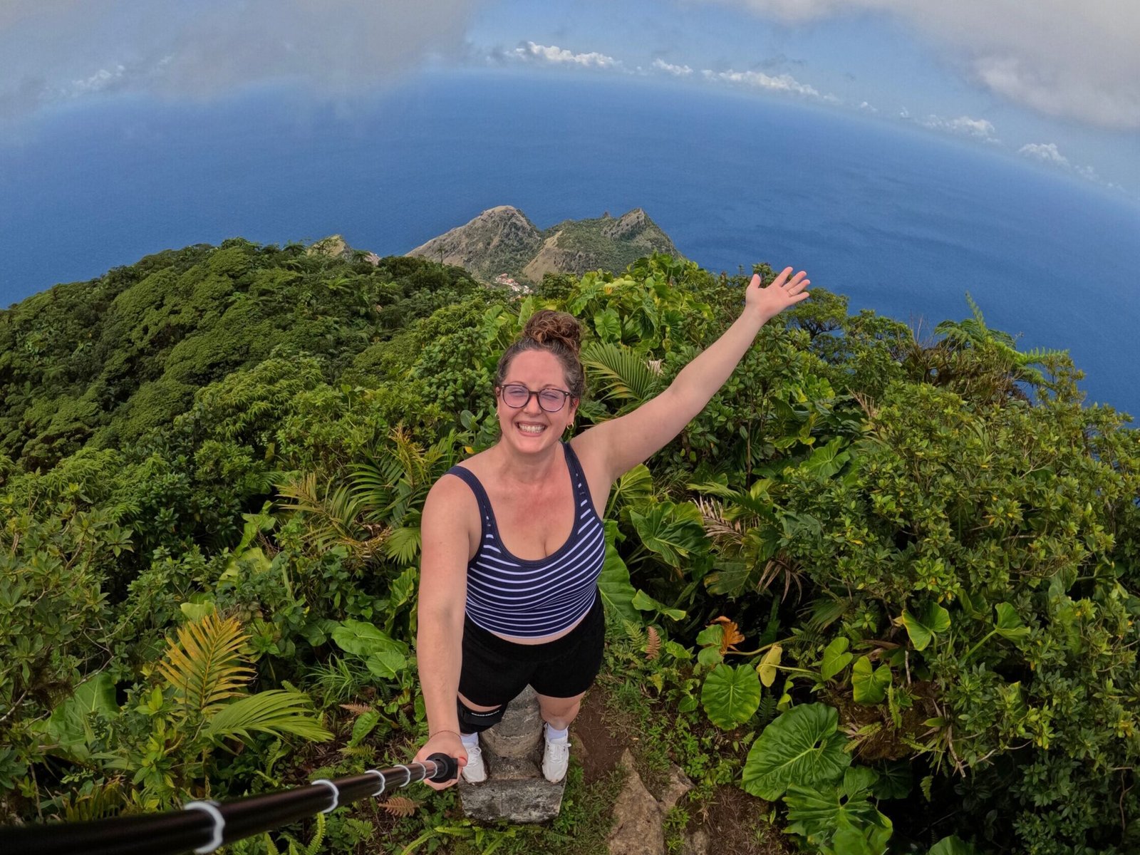 Person hiking with ocean view