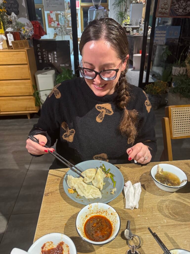 Eating handmade dumplings at a Enchanted Garden Great Wall Holiday Guesthouse