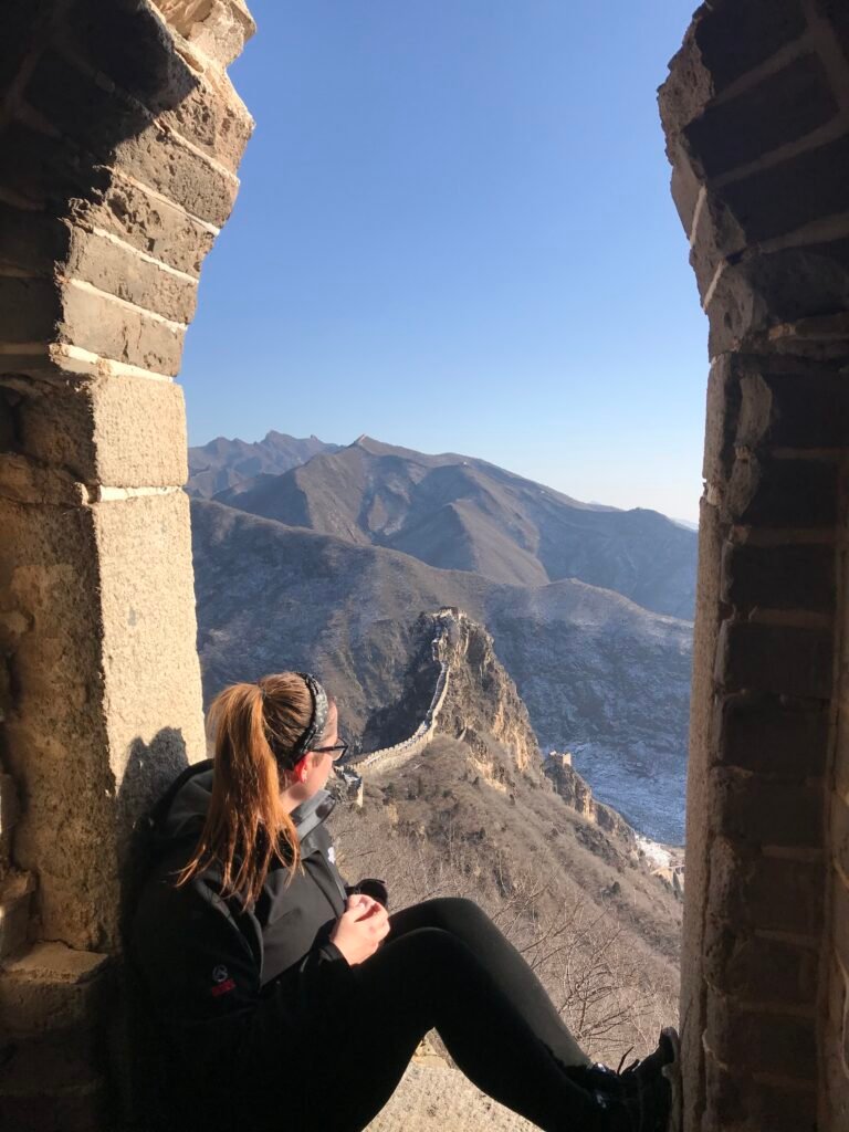 Looking out over the mountains from a watchtower on the Great Wall of China.